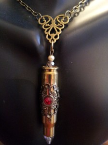 Bullet necklace with Swarovski crystal filagree.